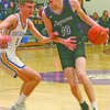 Carter Fox (#10) gets past Mankato Loyola player TJ O’Malley at Friday night’s game.