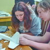 Jocelyne Viveros, left, and Owen Dague watched a build video and work on assembling their aircraft.

SUBMITTED PHOTO
