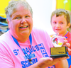SPL School teacher Cindy Fitzner proudly shows off her Golden Apple Award presented for May 2023 by KEYC television.
TRIBUNE PHOTO